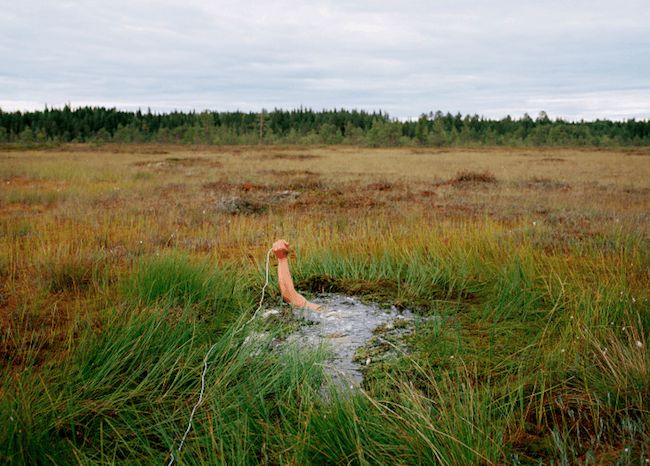 Antti Laitinen, Self-portrait on the swamp, 2002.